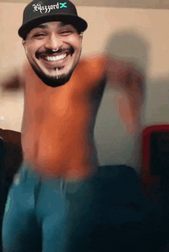 a shirtless man wearing a hat that says blizzard on it