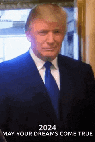 a man in a suit and tie with the words 2024 may your dreams come true