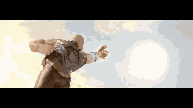 a man in a cape and gloves is flying through the air