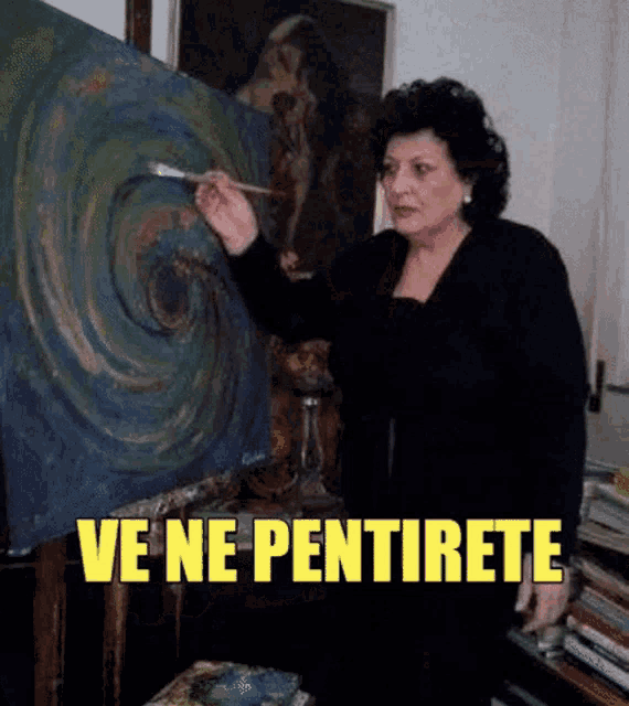 a woman is painting a picture with the words ve ne pentirete written above her
