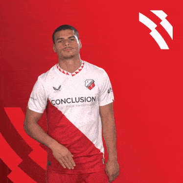 a man wearing a red and white shirt that says conclusion