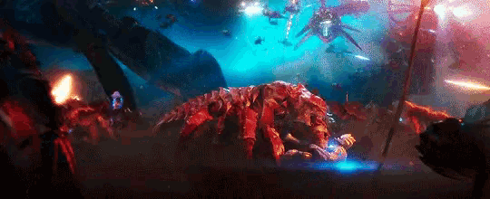 a giant crab is being attacked by a group of robots