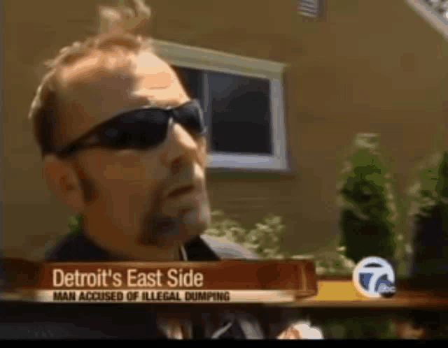 a man wearing sunglasses is featured on a detroit 's east side news channel