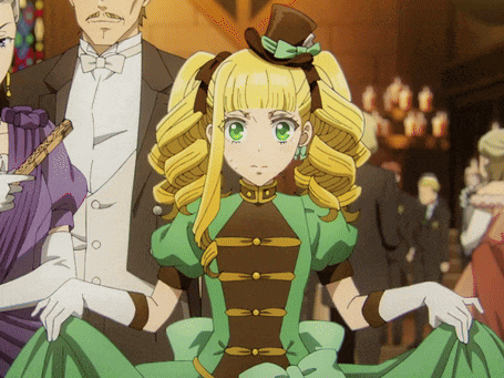 a girl with blonde hair and green eyes is wearing a green dress