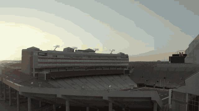 a large stadium with a large n on the top of it