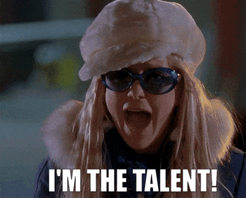 a blonde woman wearing sunglasses and a fur hat says i 'm the talent