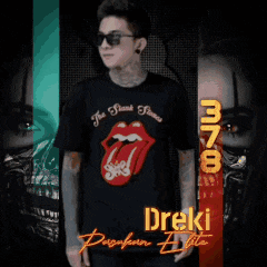 a man wearing sunglasses and a rolling stones shirt