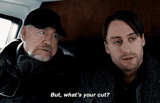 two men are sitting next to each other and one of them is asking the other what 's their cut