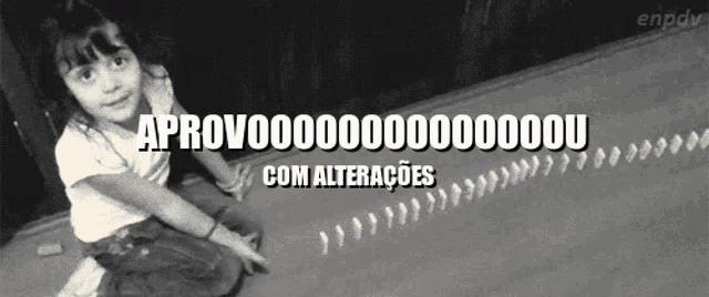 a black and white photo of a little girl with the words aprovado com alteracoes
