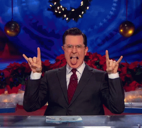 Colbert GIF - Stephen Colbert Rock On Rock Out GIFs