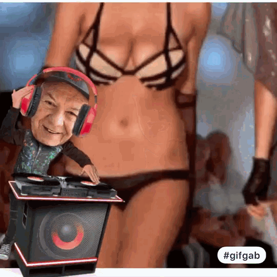 a gif of a man wearing headphones playing music next to a woman in bikini