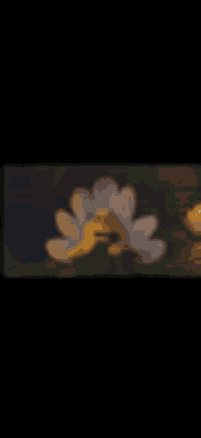 a blurred image of a flower with a bee on it