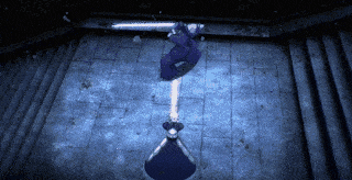 a person is standing in a dark room with a light coming out of it