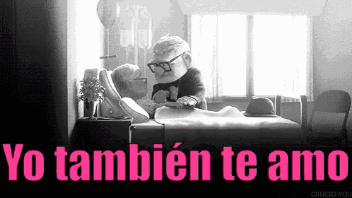 a black and white photo of an elderly couple in a hospital bed with the words yo tambien te amo in pink