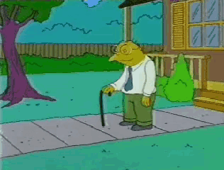 a cartoon of a man with a cane standing on a sidewalk in front of a house