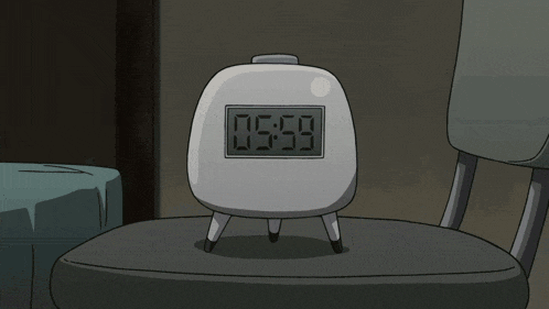 a cartoon character is laying on a bed with a pillow