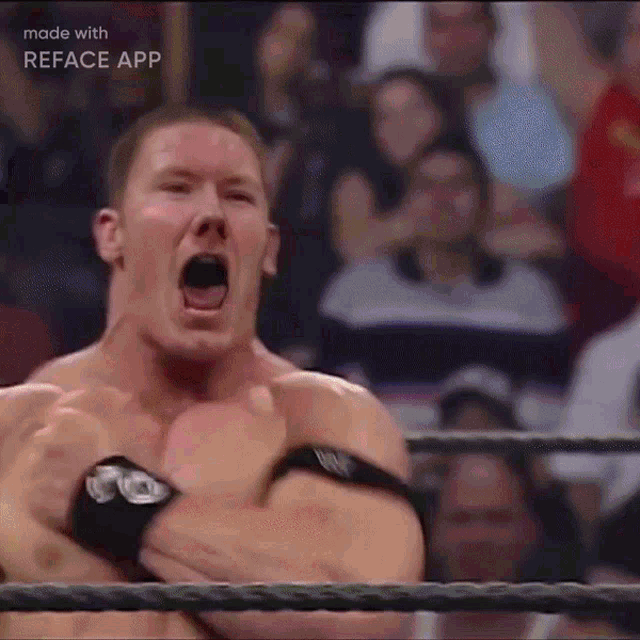 a man in a wrestling ring with his mouth open is made with the reface app