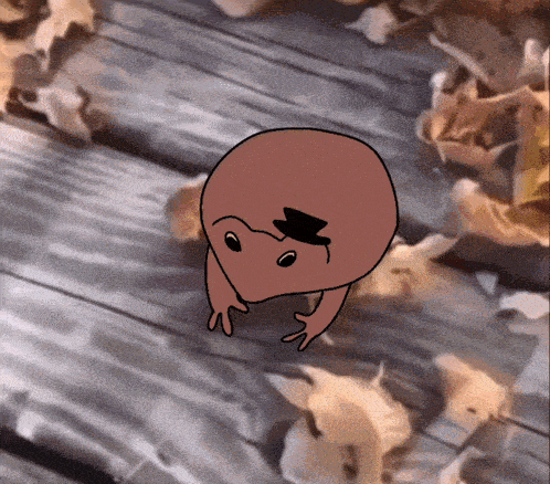 a cartoon frog with a top hat is walking on a wooden surface