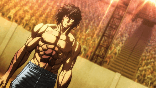 a man with a very muscular torso is standing in front of a crowd of people