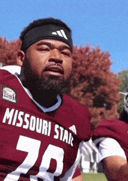 a man in a missouri state football jersey