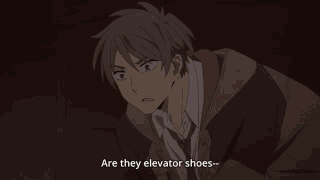 a man in a suit and tie is saying " are they elevator shoes "