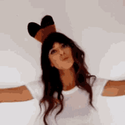 a woman wearing bunny ears on her head