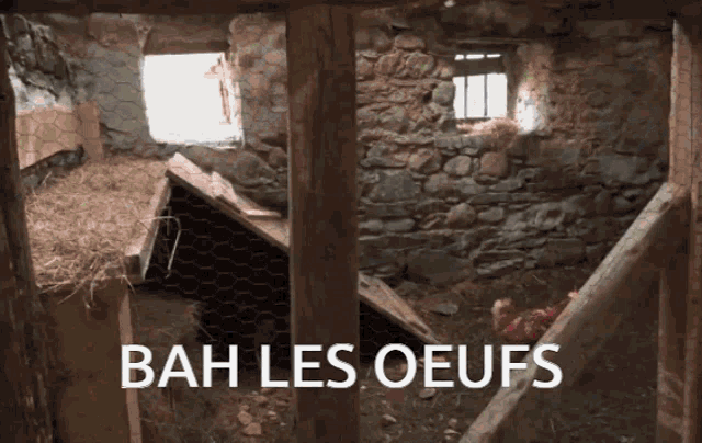 a chicken coop with the words bah les oeufs on the bottom
