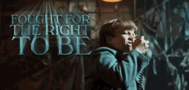 a boy singing into a microphone with the words " fought for the right to be " above him