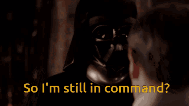 darth vader is standing in the dark with the words so i 'm still in command behind him