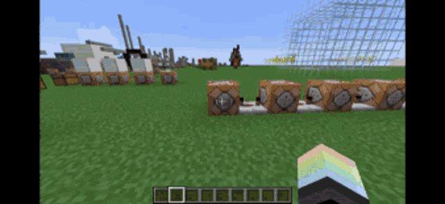 a screenshot of a video game with a rainbow colored block in the middle