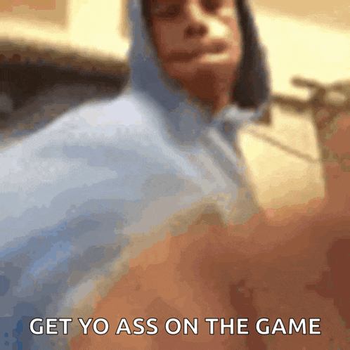 a blurry picture of a man with the words get yo ass on the game