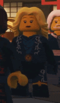 a close up of a lego figure with blonde hair