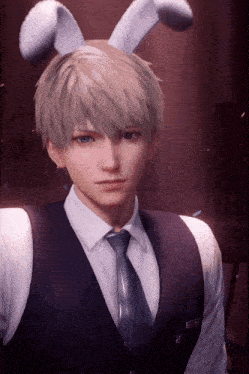 a man in a suit and tie has bunny ears on