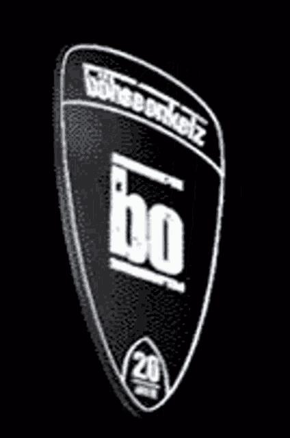 a black and white shield with the word bo on it .