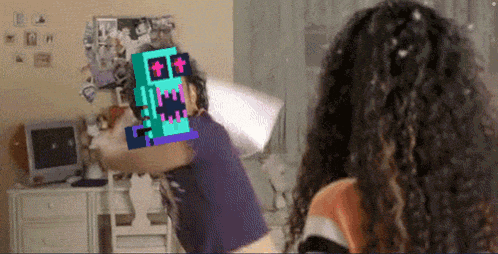 a girl with curly hair is standing in front of a computer with a pixelated image of a robot on her head