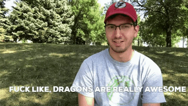 a man wearing glasses and a red hat says fuck like dragons are really awesome