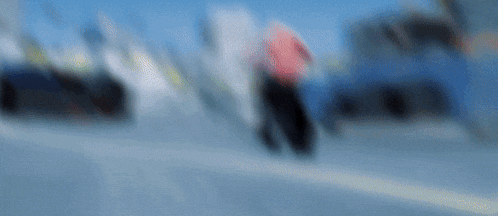 a blurry picture of a person riding a bike