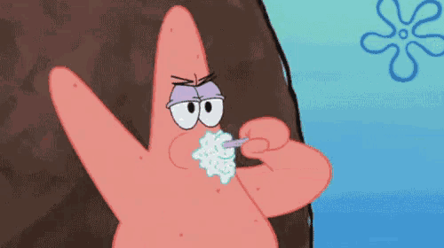 patrick star is brushing his teeth with a toothbrush