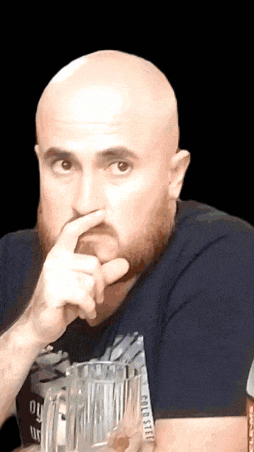 a bald man with a beard wearing a shirt that says ' california '