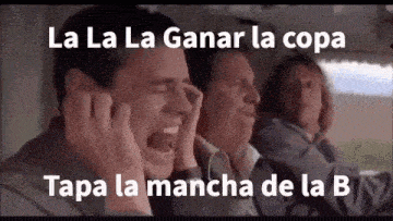a group of men are sitting in a car and one of them is covering his ears with his hands .
