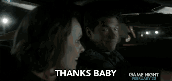 a man and a woman are sitting in a car and the man is smiling and the woman is saying thanks baby