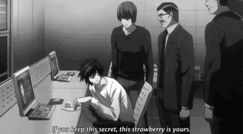 a man sits at a desk in front of a computer and says if you keep this secret this strawberry is yours ..