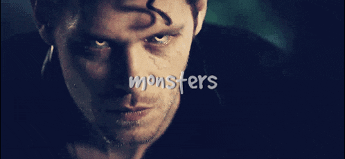 a close up of a man 's face with the word monsters on the bottom