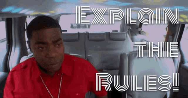 a man in a red shirt is sitting in the back seat of a car with the words explain the rules written above him