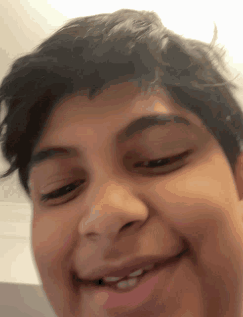 a close up of a person 's face with their mouth open