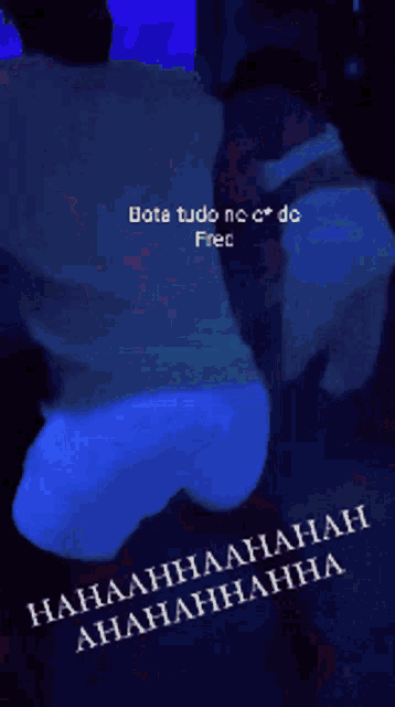 a picture of a person holding a blue object that says ' bota tudo no c * do fre '