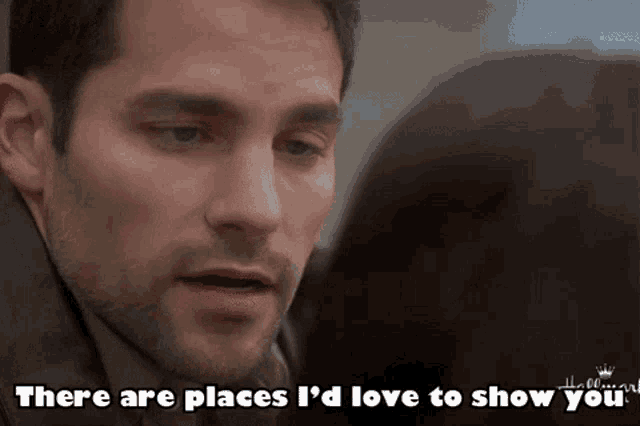 a man is looking at a woman and saying there are places i 'd love to show you