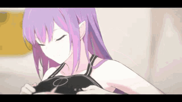 a girl with purple hair is wearing a black top
