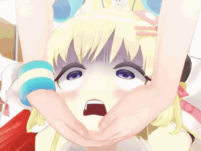 a girl with a surprised look on her face is being held by someone