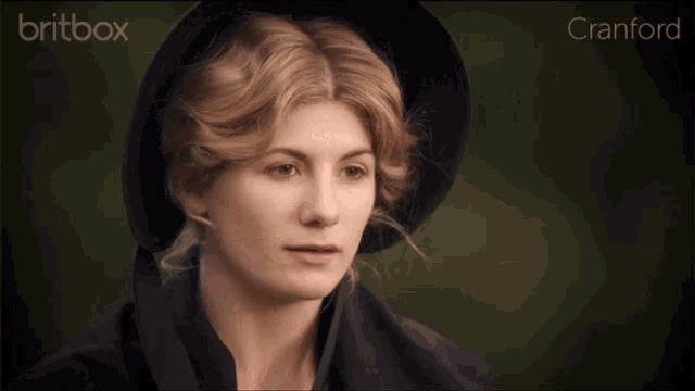 a woman wearing a black hat with britbox cranford in the corner